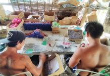 Young men make f irecrackers somewhere in Iloilo City’s Arevalo district which is traditionally deemed the “firecracker capital” of Iloilo. The Department of Health in Western Visayas is discouraging people from setting off f irecrackers to celebrate the holidays, calling it a hazardous practice.