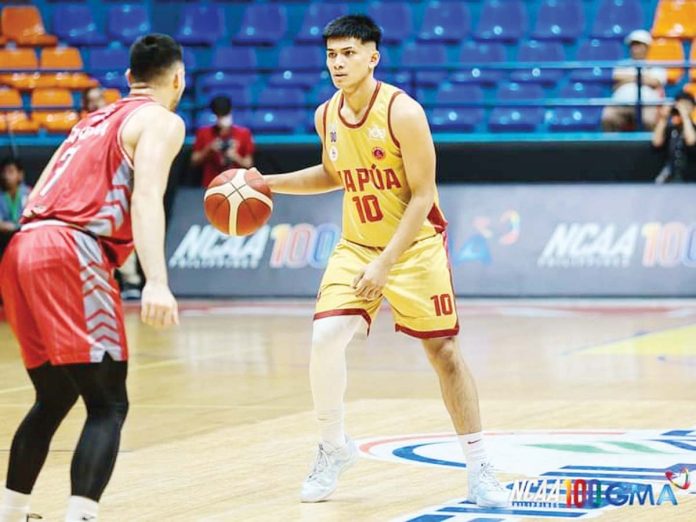 National University Bulldogs’ Jolo Manansala gestures after making a three-point shot. UAAP PHOTO