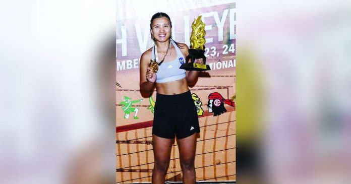 Negrense Honey Grace Cordero of the National University Lady Bulldogs displays her MVP trophy. UAAP PHOTO