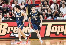 Bacolodnon Donn Spencer Lim rejoices after National University Bulldogs prevailed over University of the Philippines Fighting Maroons. UAAP PHOTO