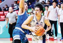 Adamson University Falcons’ Royce Mantua protects the ball from the defense of Ateneo de Manila University Blue Eagles’ Shawn Tuano. UAAP PHOTO