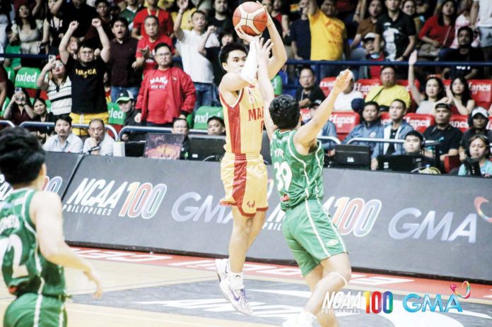 Mapua University Cardinals’ Clint Escamis pulls up for a game-winning three-pointer from way beyond the arc. PHOTO COURTESY OF NCAA/GMA SPORTS