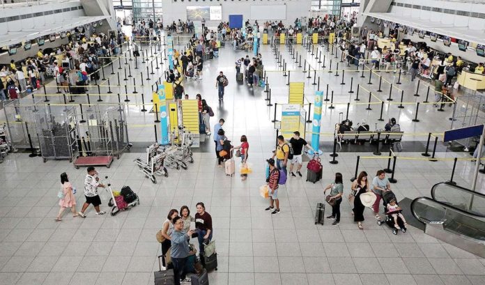 BMI Research says tourist arrivals in the Philippines hit 4.5 million from January to October 2024 – higher than the 4.1 million tallied in the same period in 2023. Photo shows the Ninoy Aquino International Airport Terminal 3. INQUIRER PHOTO / RICHARD A. REYES