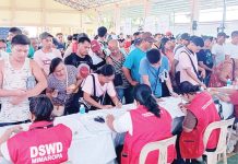 The Ayuda para sa Kapos ang Kita Program (AKAP) was launched nationwide by the Department of Social Welfare and Development (DSWD) on May 18, 2024 with an initial funding of P3 billion. Photo taken that day and released by the DSWD’s Mimaropa field office shows the first wave of applicants who came for the cash assistance ranging from P3,000 to P5,000 per beneficiary. INQUIRER.NET PHOTO