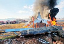 An ill-fated South Korean airplane burns after it crashed against a wall upon landing. BBC