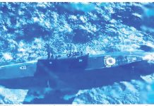 Contributed photo shows the Russian Navy’s Ufa submarine surfacing on Philippine waters Thursday last week, November 28. The 74-meter-long vessel is capable of firing Kalibr cruise missiles, which were used recently against Ukraine.