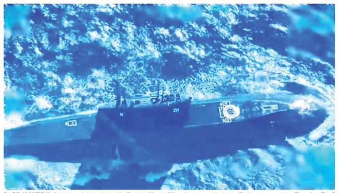 Contributed photo shows the Russian Navy’s Ufa submarine surfacing on Philippine waters Thursday last week, November 28. The 74-meter-long vessel is capable of firing Kalibr cruise missiles, which were used recently against Ukraine.