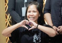 Mary Jane Veloso, who was on death row in Indonesia and was nearly executed by firing squad in 2015, makes a heart sign during a press conference before her repatriation to the Philippines, at Soekarno-Hatta International Airport in Tangerang, Indonesia on Dec. 17. AP