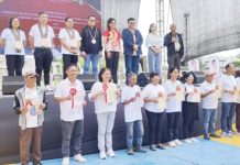 The Department of Agrarian Reform distributes Certificates of Condonation with Release of Mortgage and land titles in a ceremony at Iloilo Sports Complex in Iloilo City on Saturday, Dec. 21, 2024. Over 5,000 farmers were freed from their debts. PHOTO COURTESY OF PNA