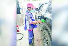 Fuel companies will increase prices per liter of gasoline by P0.40 and reduce prices of diesel by P0.50 and kerosene by P0.75 today, Dec. 10, 2024. Photo shows a gasoline station attendant serving a customer at Patron gas station in Mali-ao, Pavia, Iloilo on Monday, Dec. 9, 2024. AJ PALCULLO/PN