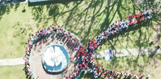 On December 4, the Iloilo Provincial Health Office, in collaboration with the Concepcion local government unit, commemorated World AIDS Day with the theme, “Take the Rights Path.” The event gathered students, teachers, barangay officials, and stakeholders to promote an inclusive approach to combating HIV/AIDS. Photo shows the participants forming a large human red ribbon. The red ribbon is a global symbol of awareness and support for people living with HIV/AIDS. Photo from Iloilo Provincial Health Office Facebook Page