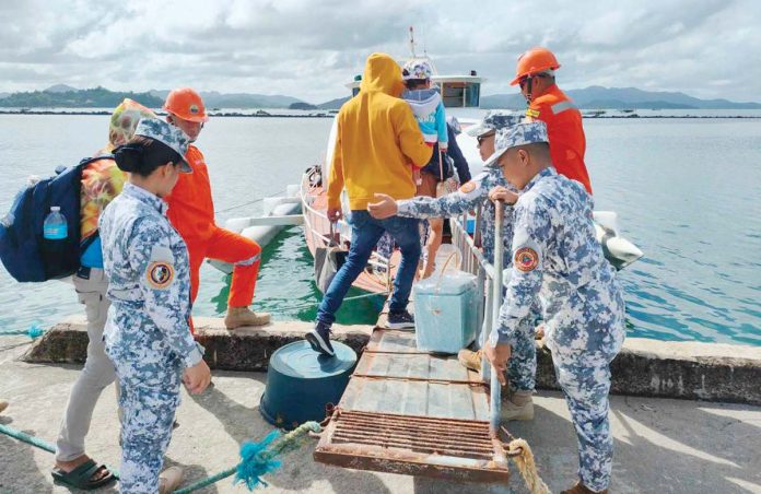 As part of “Oplan Biyaheng Ayos: Pasko 2024”, personnel from the Philippine Coast Guard Station Capiz, along with its Operational Control Units and the Coast Guard Search and Rescue Base Roxas, provided passenger assistance and intensified port security at Culasi Port, Barangay Culasi, Roxas City, Capiz, on December 26, 2024. PHOTOS FROM COAST GUARD STATION CAPIZ FACEBOOK