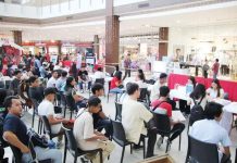 Job applicants queue up at a job fair held at a mall in Roxas City. FILE PHOTO FROM MAYOR RONNIE DADIVAS FB PAGE