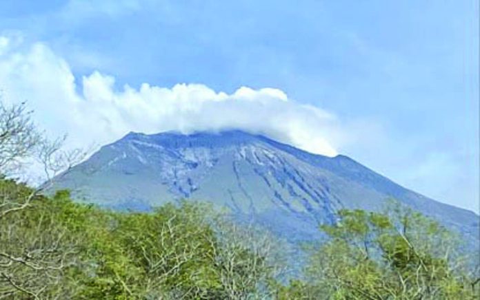 A shot of Mt. Kanlaon taken from Barangay Biak na Bato in La Castellana, Negros Occidental on Tuesday, Dec. 24, 2024. Office of Civil Defense Region 6 Director Raul Fernandez, in an interview on Wednesday, Dec. 25, 2024, said preparations were underway to establish a tent city in Himamaylan City in case authorities raise the alert level due to the volcano's unrest. PHOTO COURTESY OF TF KANLAON