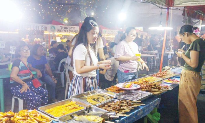 The three-day Calle Real Christmas Street Night Market from Nov. 15 to 17, 2024 was filled with food, drinks, entertainment, shopping, and cultural showcases, drawing locals and tourists alike. JERRY TREÑAS/FACEBOOK PHOTO