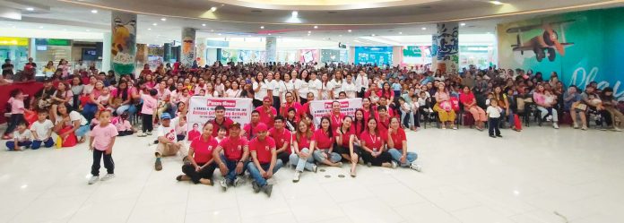 Panay News team poses with over 600 children beneficiaries from barangays Amparo, Balabag, Cabugao Norte, Mali-ao, Pagsanga-an, Pal-agon, Pandac, Tigum, Ungka I, and Ungka II in Pavia, Iloilo.