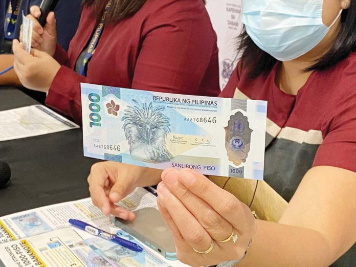 The P1,000 polymer banknote features a Philippine eagle and the national flower Sampaguita. PHOTO COURTESY OF PIA