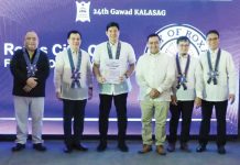 Mayor Ronnie Dadivas (third from left) and City Disaster Risk Reduction and Management head Pong Saneo (fourth from left) receive the “Beyond Compliant” seal of the Gawad Kalasag for Roxas City during the awarding ceremony in Iloilo City on Dec. 11, 2024. MAYOR RONNIE DADIVAS FACEBOOK PAGE PHOTO