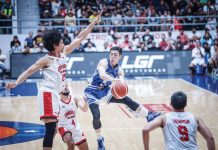 Hong Kong Eastern’s Chan Siu Wing looks to pass the ball after being defended by Barangay Ginebra San Miguel Kings’ Japeth Aguilar. PBA PHOTO