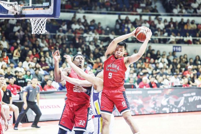 Barangay Ginebra San Miguel Kings’ Earl Scottie Thompson skies for the offensive rebound. PBA PHOTO