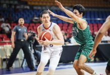 NLEX Road Warriors’ Robert Bolick Jr. protects the ball from the defense of Negrense guard Mark Nonoy of Terrafirma Dyip. PBA PHOTO