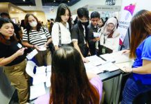 Hopefuls hunt for jobs at a job fair in Pasay City. The Philippine Statistics Authority reported Friday, Dec. 6, 2024, that the country's unemployment rate fell to 3.9 percent in October. PNA PHOTO BY YANCY LIM