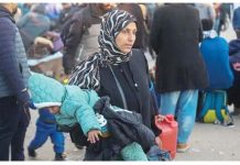 Palestinians wait to be allowed to go to their homes in the Gaza Strip. GETTY IMAGES