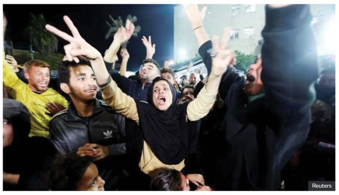 Celebrations erupted across Gaza Strip as news of the ceasefire agreement between Israel and Hamas spread. REUTERS