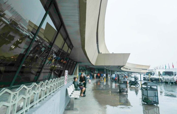 People arrive at the departure area of the Ninoy Aquino International Airport Terminal 1 on September 4, 2024. JONATHAN CELLONA, ABS-CBN NEWS PHOTO