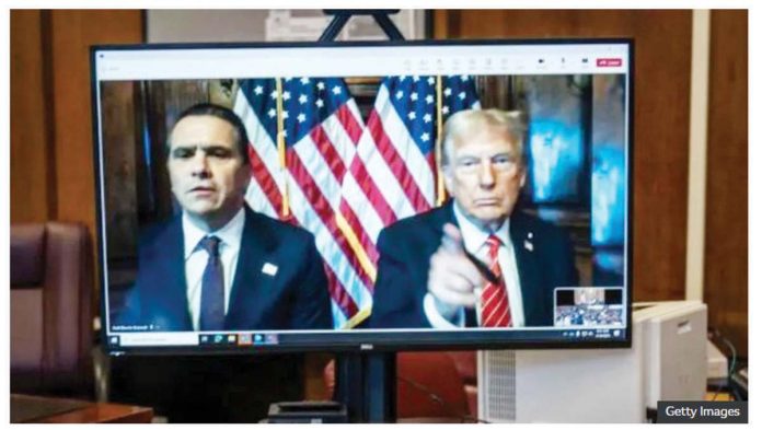 US President-elect Donald Trump and his lawyer Todd Blanche appear virtually on a computer desktop screen from Florida for his sentencing in his Manhattan hush money case. GETTY IMAGES