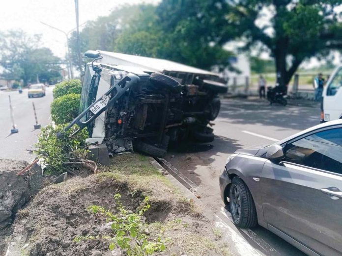 A delivery van turned turtle after being involved in a collision with a private car on Araneta Street, Barangay Singcang Airport, Bacolod City on Nov. 25,2024. RMN DYHB BACOLOD 747/FACEBOOK PHOTO