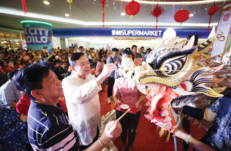 EYE DOTTING. Iloilo City’s Mayor Jerry P. Treñas and Vice Mayor Jeffrey Ganzon join the eye dotting ceremony during the opening of the 2025 Chinese New Year celebration at SM City Iloilo on Jan. 27. Eye dotting is a ritual that awakens a lion before it performs in a Chinese lion dance. The goal is to give the lion energy, life, and the ability to bring good luck and protection. ARNOLD ALMACEN/ILOILO CITY MAYOR'S OFFICE PHOTO