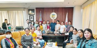 These 15 repatriated Ilonggo overseas Filipino workers thank the Iloilo provincial government for the P10,000 financial assistance they each received. According to Provincial Administrator Raul Banias, they suffered from maltreatment by their employers, got sick, or figured in an accident. PHOTO FROM PROVINCIAL ADMINISTRATOR DR. RAUL BANIAS