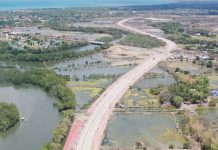 The P2.261-billion Iloilo River North Bank Road (Iloilo Sunset Boulevard) covers a five-kilometer, four-lane concrete road. It connects Barangay Tabucan in Mandurriao, Iloilo City, to Barangay Cagbang in Oton, Iloilo passing through the Iloilo Business Park and intersecting with the Iloilo Circumferential Road. DPWH Region 6 photo