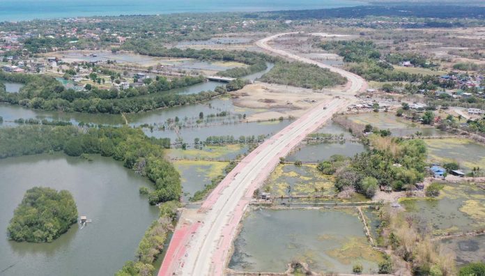 The P2.261-billion Iloilo River North Bank Road (Iloilo Sunset Boulevard) covers a five-kilometer, four-lane concrete road. It connects Barangay Tabucan in Mandurriao, Iloilo City, to Barangay Cagbang in Oton, Iloilo passing through the Iloilo Business Park and intersecting with the Iloilo Circumferential Road. DPWH Region 6 photo