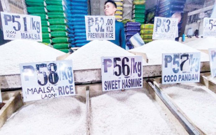 The Department of Agriculture says maximum suggested retail price (MSRP) for imported rice will be slashed to P55 per kilogram by Feb. 1, lowered further to P52 by February 15, and by March 1, it is expected to break the P50 per kilo, with the MSRP at P49. PNA PHOTO BY JOAN BONDOC