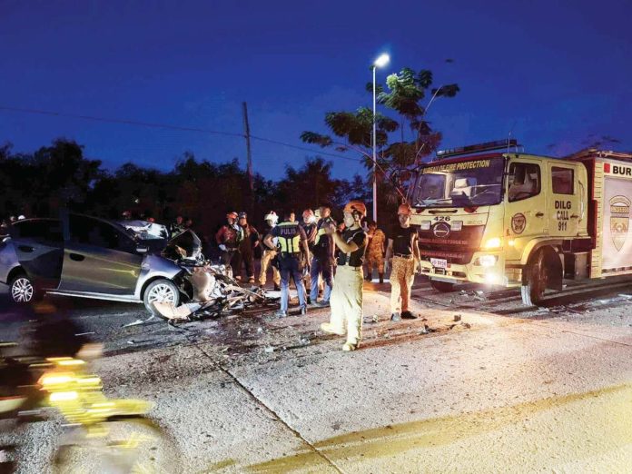 Two people were killed when a speeding car collided with a 10-wheeler truck in Barangay Tacas, Jaro, Iloilo City early Monday morning, Jan. 27, 2025. The impact had also severely damaged the car's front portion. K5 NEWS FM ILOILO 88.7 DIGITAL PHOTO