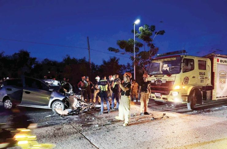 Two people were killed when a speeding car collided with a 10-wheeler truck in Barangay Tacas, Jaro, Iloilo City early Monday morning, Jan. 27, 2025. The impact had also severely damaged the car's front portion. K5 NEWS FM ILOILO 88.7 DIGITAL PHOTO