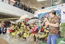 Haw-as Festival of Dumangas, Iloilo is one of the nine tribes participating in the Kasadyahan sa Kabanwahanan competition of the Dinagyang Festival 2025. Photo shows dancers of Haw-as tribe performing at SM City Iloilo. MUNICIPALITY OF DUMANGAS/FACEBOOK PHOTO