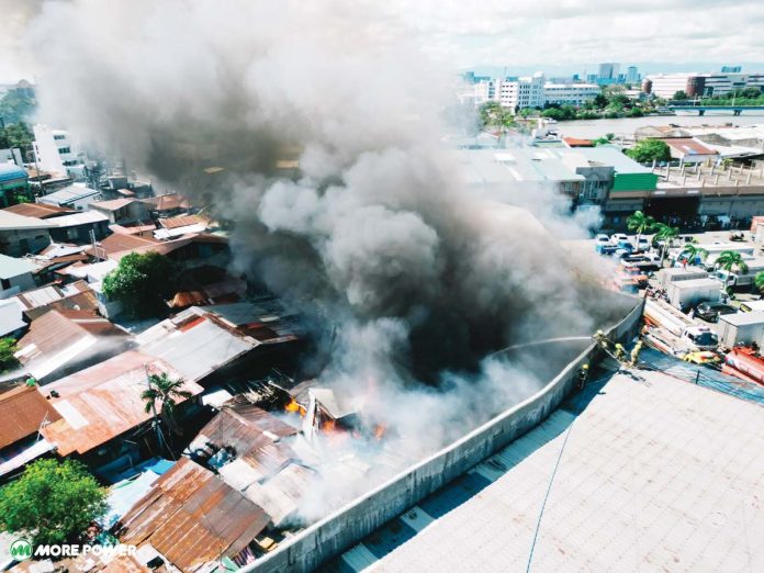 A devastating fire swept through a neighborhood in Barangay Rizal, Lapuz, Iloilo City, around 1:05 p.m. on Tuesday, Jan. 7, 2025, leaving one person dead and 31 families homeless. This dramatic drone photo shows thick plumes of smoke billowing from the scene. MORE POWER PHOTO