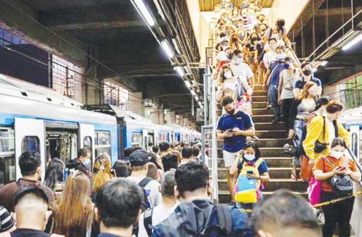 The International Monetary Fund projected that 14 percent of the total workforce in the Philippines is at risk of being replaced by artificial intelligence. File photo shows passengers queuing to ride a train while others exit at a station in Manila. REUTERS/ELOISA LOPEZ