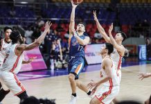 Ilonggo Anjo Caram of Meralco Bolts attacks the NorthPort Batang Pier’s defense for an inside basket. PBA PHOTO