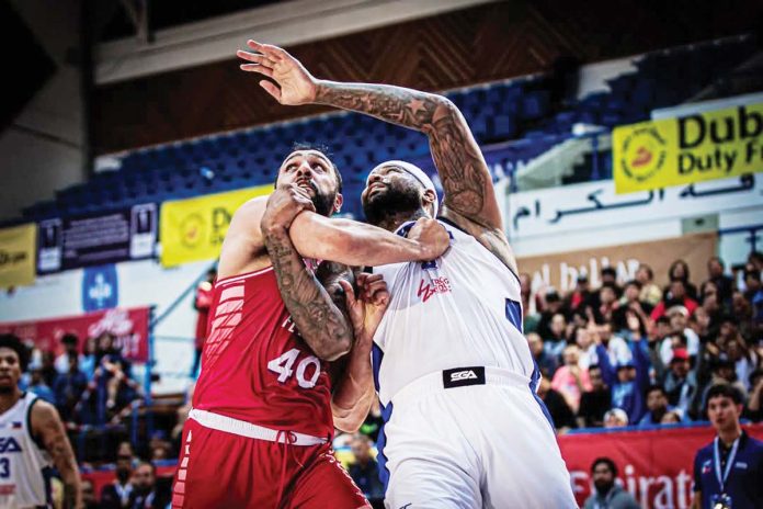 Strong Group Athletics-Pilipinas’ DeMarcus Cousins battles Beirut First’s Mohamad Ali Haidar for the rebound. PHOTO COURTESY OF DUBAI BASKETBALL CHAMPIONSHIP