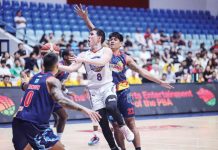 NLEX Road Warriors’ Robert Bolick Jr. eludes the defense of Rain or Shine Elasto Painters’ Jhonard Clarito for a layup. PBA PHOTO