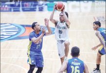 Negrense Mark Nonoy of Terrafirma Dyip tries to score against the defense of TNT Tropang Giga’s Jayson Castro. PBA PHOTO