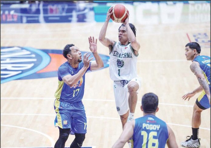 Negrense Mark Nonoy of Terrafirma Dyip tries to score against the defense of TNT Tropang Giga’s Jayson Castro. PBA PHOTO