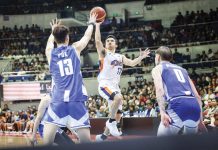 Ilonggo Anjo Caram of Meralco Bolts tries to score against the defense of Hong Kong Eastern’s Yuet Yeung Pok. PBA PHOTO