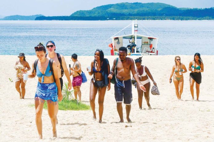 Tourists flock to Daku Island in Siargao Island, Surigao Del Norte. MARK DEMAYO/ABS-CBN NEWS FILE PHOTO