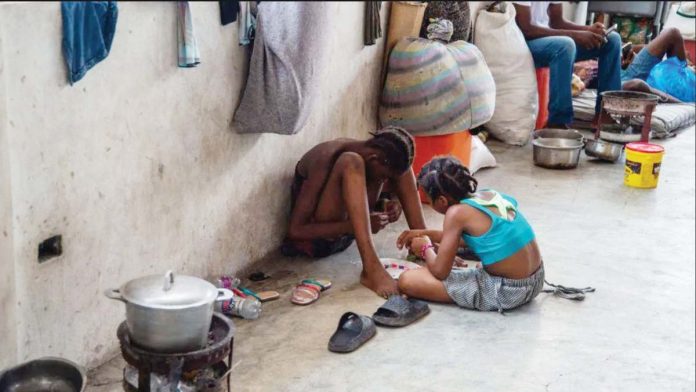 Children gather in a displacement camp at the Lycée Marie Jeanne school in Port-au-Prince, Haiti. GETTY IMAGES