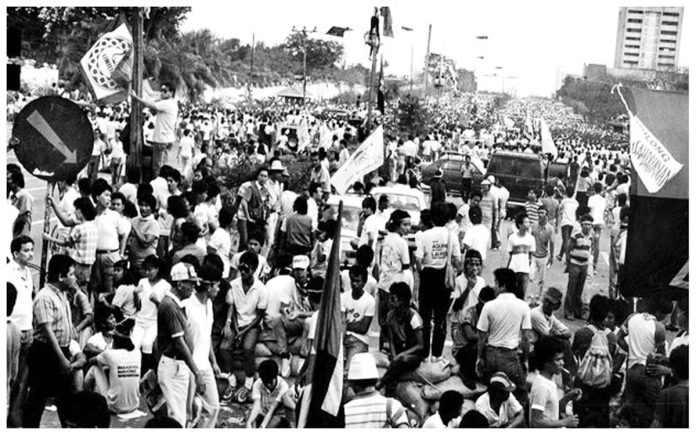 During the height of what will be known as the People Power Revolution in 1986, people filled the stretch of Edsa from Ortigas Avenue to Cubao to support and protect the military officials and their followers who demanded the immediate ouster of then President Ferdinand Marcos Sr. INQUIRER FILE PHOTO